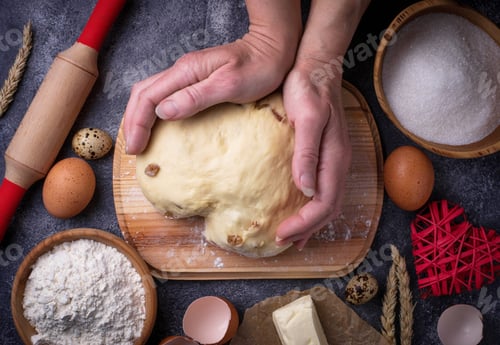Preview: Female hands knead the dough. Backing concept