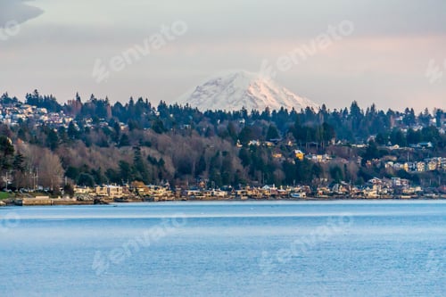Preview: The Top Of Mount Rainier Can Be Seen Above The West Seattle Shoreline.