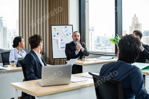 Preview: Group of young businessman and woman working in office with confidence.