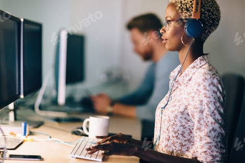 Preview: Portait of software designer working in office