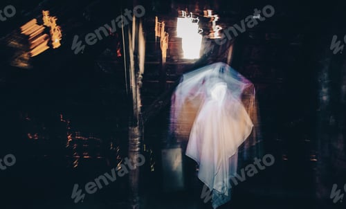 Preview: blurred image of ghost in the attic haunted house for Halloween