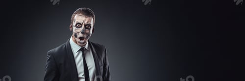 Preview: Surprised Skull-Faced Man in Suit Wide Banner