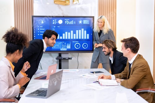 Preview: Employee on job corporate Business colleagues around the table look presentation from large screen