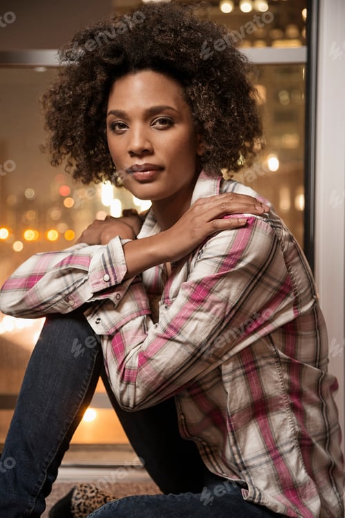 Preview: Beautiful Woman Posing by City Window at Night
