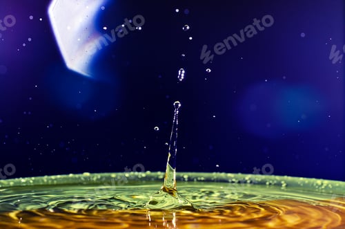 Preview: The water drop with interesting colorful blurred background
