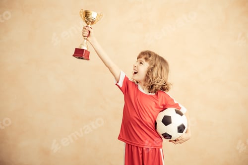 Preview: Child is pretending to be a soccer player