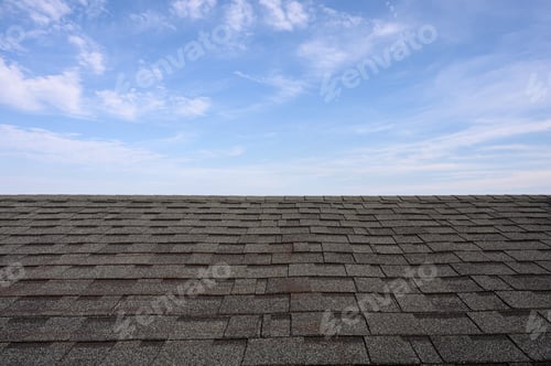 Preview: Dark roof tiles with blue sky