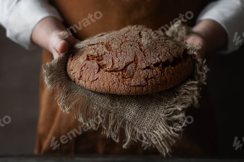 Preview: A man holding a bread
