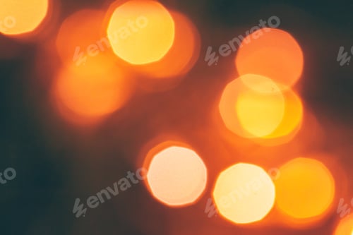 Preview: Abstract Gold bokeh sparkle on dark background
