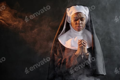 Preview: Nun Praying in Dark Room