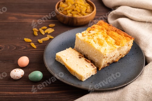 Preview: Сottage cheese Сasserole, Curd cake, with dried apricots and raisins on brown wooden