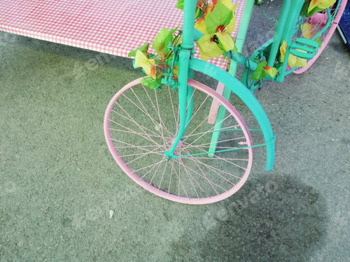Preview: Picture of a pastel candy-colored bicycle in the park