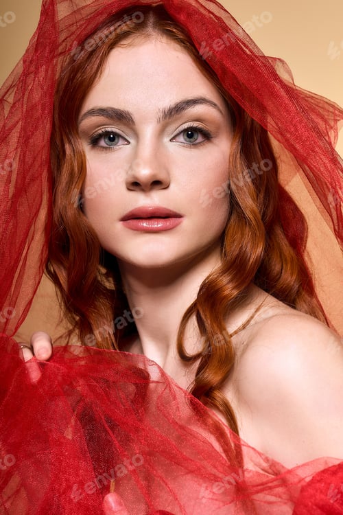 Preview: Young woman with red hair and a festive color celebrates the holiday spirit in style