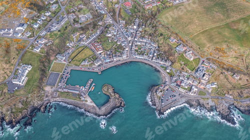 Preview: Winding river with ample cerulean waters stretching far in Portpatrick harbor, Scotland