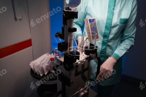 Preview: Female doctor standing near modern medical equipment