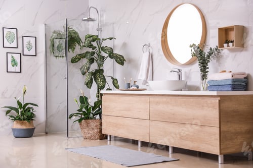 Preview: Green plants in elegant modern bathroom. Interior design
