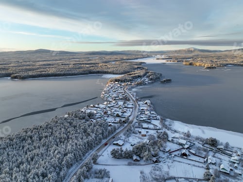 Preview: Winter village on a peninsula surrounded by frozen lake