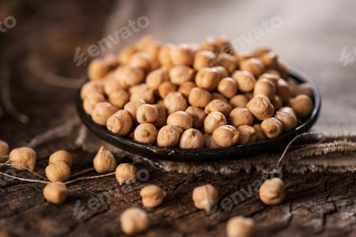 Preview: Organic chickpea on wooden background