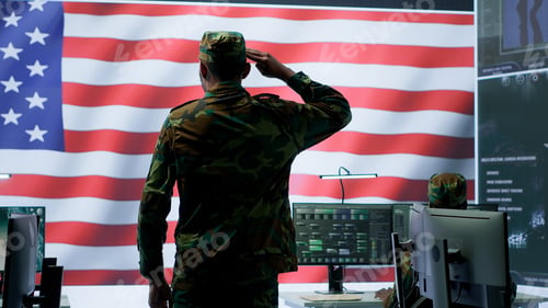 Preview: American military personnel supervising cyber war activity in high tech office