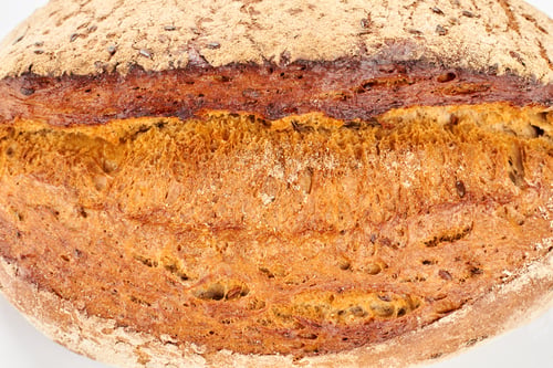 Preview: Close up view of fresh bread with seeds.