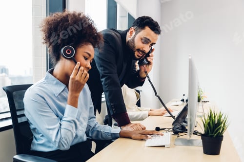 Preview: Call center business woman talking on headset.