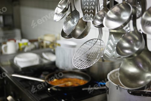 Preview: Close up of spoons in restaurant kitchen