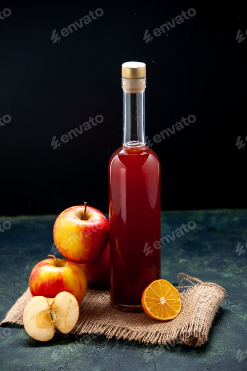 Preview: front view red apple sauce in bottle with fresh apples on dark background color juice alcohol wine