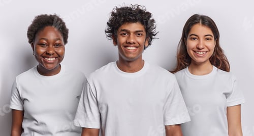 Preview: Three people being in good mood smile broadly stand next to each other express happiness dressed in