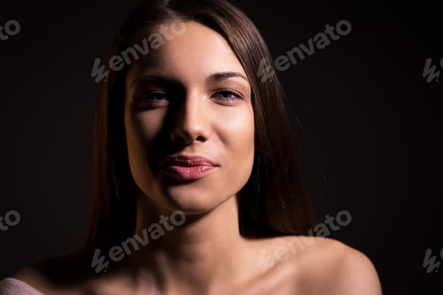 Preview: Portrait of beautiful woman with natural look and without makeup.