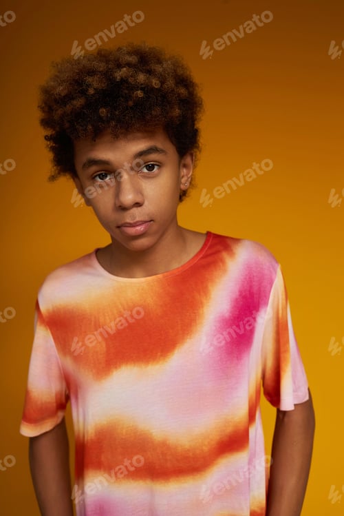 Preview: Teenage boy in stylish t-shirt with white, pink and orange ombre print