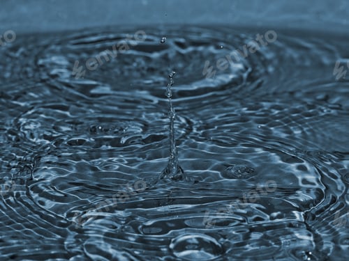 Preview: Raindrop Splatter - Close Up Photograph Of Raindrops Splashing Into Shallow Water. Filter Used For