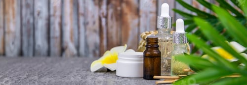 Preview: Background spa cosmetics and oils and herbs. Selective focus.