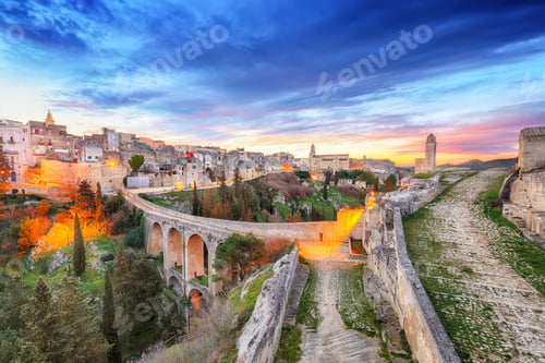 Preview: Gravina in Puglia ancient town, bridge and canyon at sunrise.