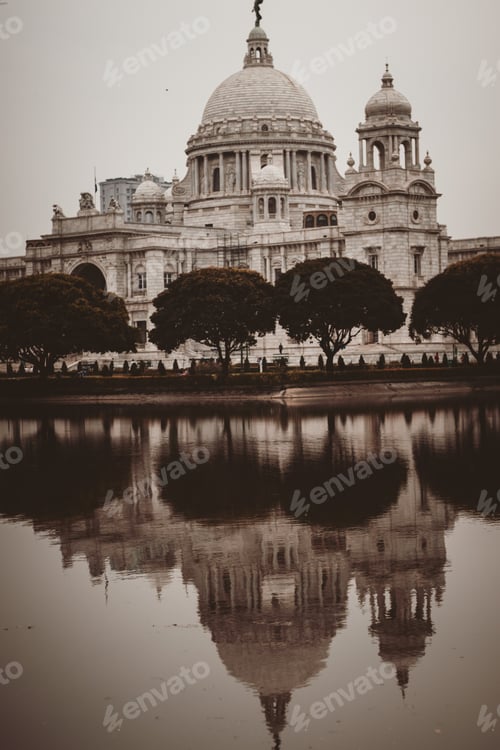 Preview: Vertical shot of Victoria Memorial reflection in a lake in Kolkata, India