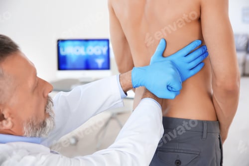 Preview: Urologist in gloves examining young patient in clinic