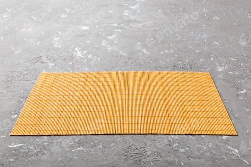 Preview: Perspective view of yellow tablecloth for food on cement background. Empty space for your design