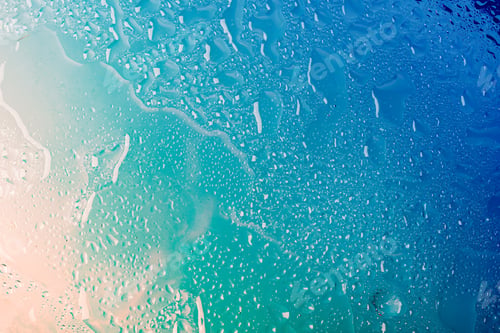 Preview: Water drops on glass, blue beige gradient. Concept of sea of relaxation. Abstract summer background