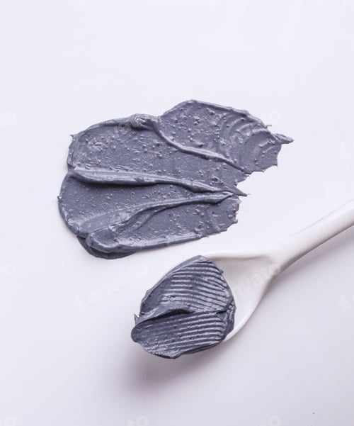 Preview: Charcoal clay texture swatch with spoon on white background