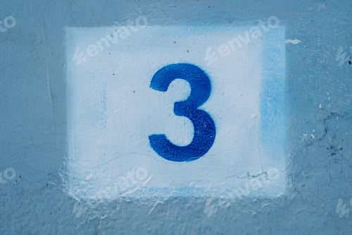 Preview: Number three drawn on a blue wall in a white rectangle