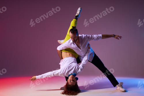 Preview: Beautiful couple performs latino dance with expression.
