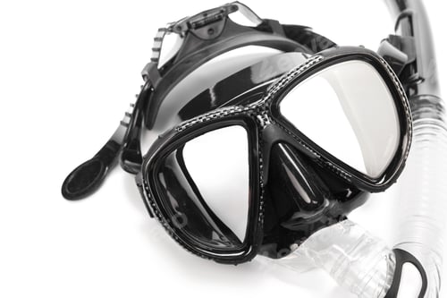 Preview: Scuba diving gear placed on a flat surface before an underwater adventure in the ocean