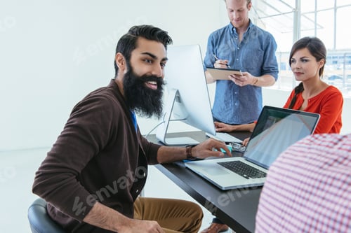 Preview: Business people in brainstorming meeting