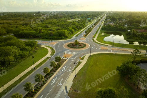 Preview: Aerial view of american suburban area with rural road roundabout intersection