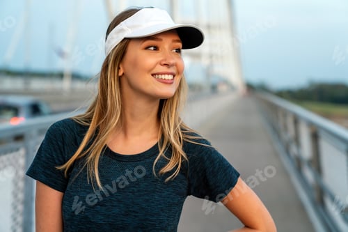 Preview: Portrait of young fit attractive happy fitness woman in city. People healthy lifestyle concept.