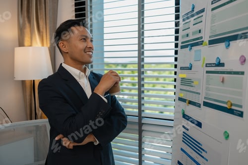Preview: Image of handsome businessman is working in office