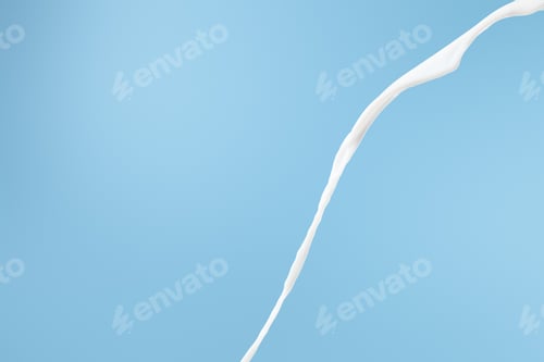 Preview: fresh flowing white milk isolated on blue