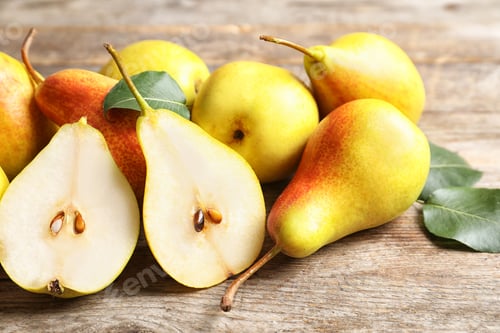 Preview: Ripe pears on wooden table. Healthy snack