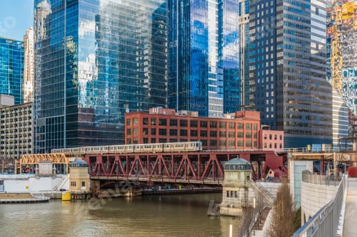 Preview: Chicago River walk with Yacht running and traing running over the rail track, illinois, USA.