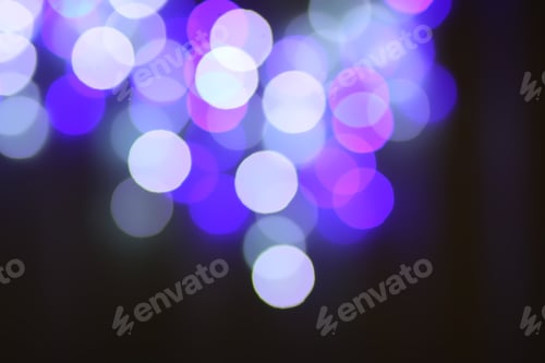 Preview: Abstract bokeh background. Blurred garland lights.