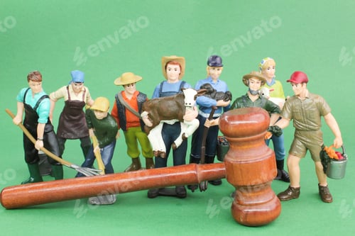 Preview: judge's hammer and laborer miniatures. the concept of labor laws.